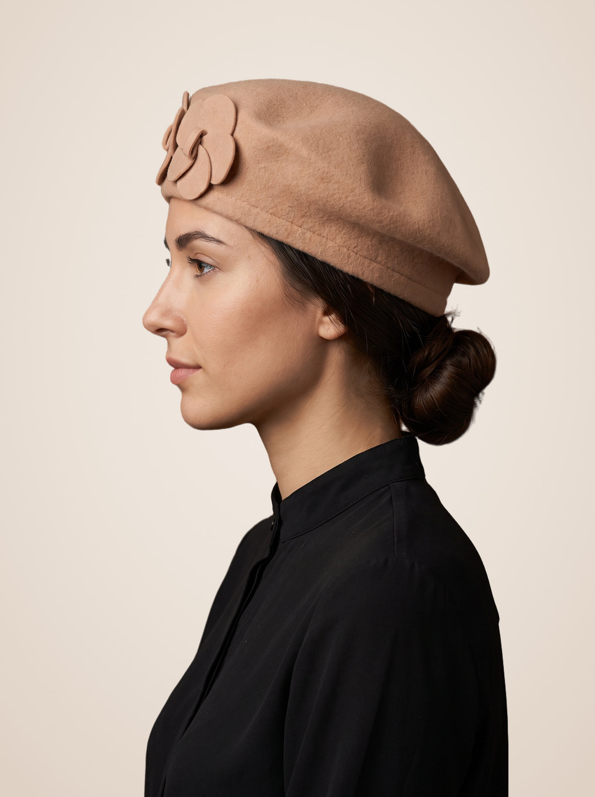 Layered Petal Rosette Wool Blend Beret in Camel, worn by a model